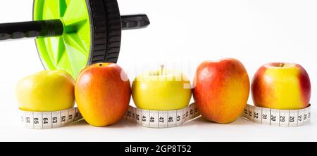 Healthy lifestyle, fitness, fruits, sport, athlete's equipment on white background. Copy space. Stock Photo