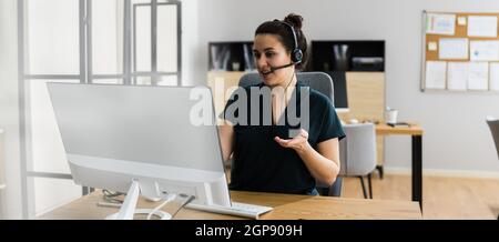 Virtual Personal Assistant Woman Making Video Conference Call Stock Photo