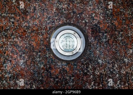 LED backlight in granite stone. Light fixture. Stock Photo