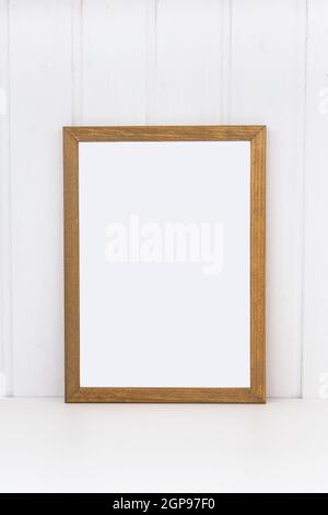 Wooden frame for paintings or photographs. Stock Photo