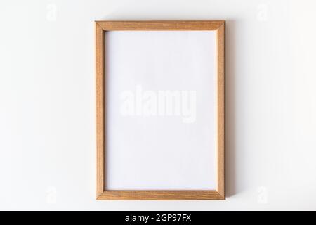 Wooden frame for paintings or photographs. Stock Photo