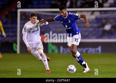 OLDHAM, UK. SEPT 28TH Oldham Athletic's Kyle Jameson tussles with Max Dean of Leeds United during the EFL Trophy match between Oldham Athletic and Leeds United at Boundary Park, Oldham on Tuesday 28th September 2021. (Credit: Eddie Garvey | MI News) Credit: MI News & Sport /Alamy Live News Stock Photo