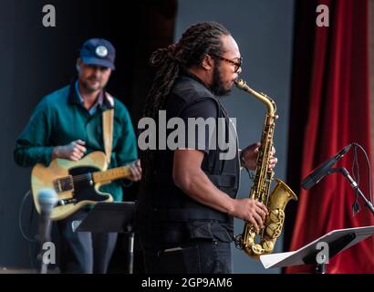 Immanuel Wilkins plays saxophone for Gerald Clayton at the 2021 Monterey Jazz Festival with Matthew Stevens on lead guitar Stock Photo