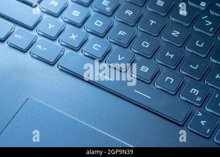 Laptop keyboard and touchpad: closeup picture Stock Photo