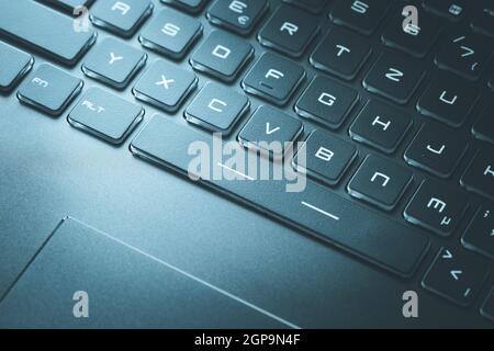 Laptop keyboard and touchpad: closeup picture Stock Photo