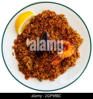 Dish seafood paella with shrimps and mussels Stock Photo