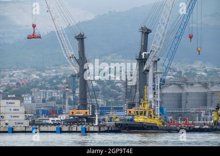 Novorossiysk, Russia - May 28, 2016: The international sea port of Novorossiysk. Port cranes and industrial objects. Marine Station. Stock Photo