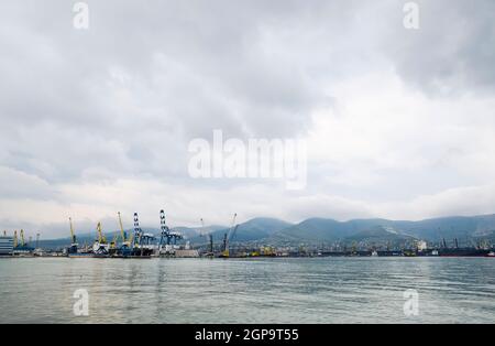 Novorossiysk, Russia - May 28, 2016: The international sea port of Novorossiysk. Port cranes and industrial objects. Marine Station. Stock Photo