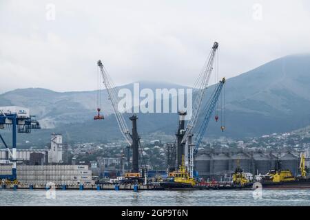 Novorossiysk, Russia - May 28, 2016: The international sea port of Novorossiysk. Port cranes and industrial objects. Marine Station. Stock Photo