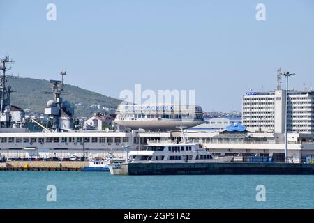 Novorossiysk, Russia - September 9, 2016: international seaports. Cargo port with port cranes. Sea bay and mountainous coast. Stock Photo