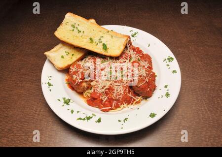 Heaping bowl full of delicious spaghetti and meatballs Stock Photo