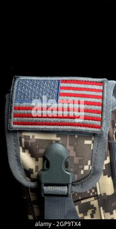 American flag, old glory patch on camouflage with room for your type. Stock Photo