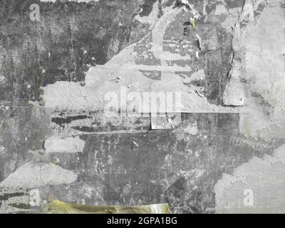 Vintage Billboard With Torn Peeled Poster.  It can be used as texture and background. Stock Photo