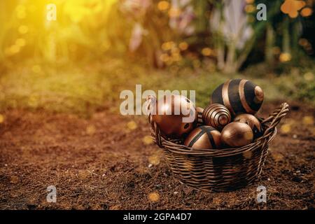 Happy Easter background with golden shine decorated eggs, copy space Stock Photo