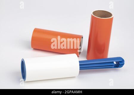 Lint Roller with blue handle on bright background Stock Photo
