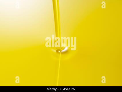 The moment olive oil is poured over the entire screen Stock Photo