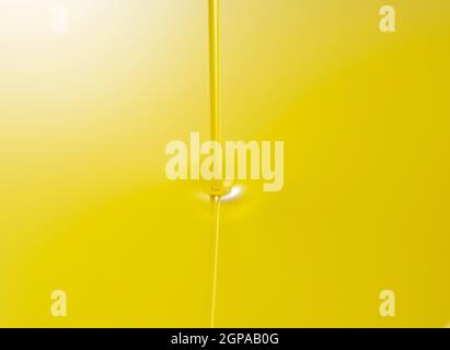 The moment olive oil is poured over the entire screen Stock Photo