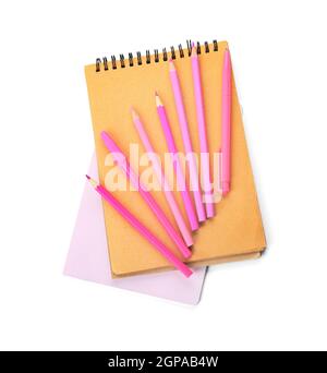 Notepads, different pencils and pens on white background Stock Photo