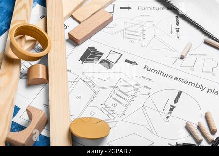 Closeup view of furniture assembling plan and tools on table Stock Photo