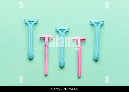 Many different razors for depilation on blue background Stock Photo