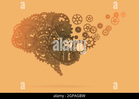 Brain loss. Metallic gears on colorful background Stock Photo