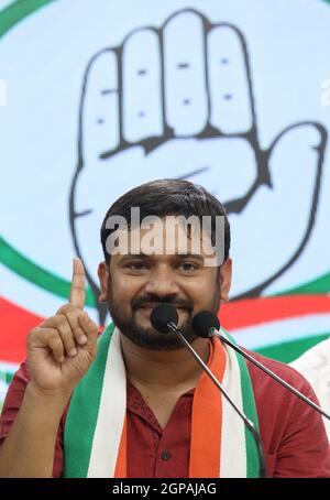 New Delhi, India. 28th Sep, 2021. Kanhaiya Kumar seen speaking during the event.Kanhaiya Kumar, Former JNU (Jawaharlal Nehru University) student's union President and CPI (Communist Party of India) leader, and Jignesh Mevani join Indian National Congress party at Congress party headquarters. Jignesh Mevani is an independent MLA (Member of Legislative Assembly) from Gujrat (Vadgam constituency). Kanhaiya and Jignesh vocal against the Prime Minister, Narendra Modi central government. Credit: SOPA Images Limited/Alamy Live News Stock Photo