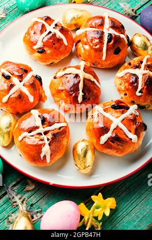 Easter hot cross buns and easter decor.Easter baked goods Stock Photo
