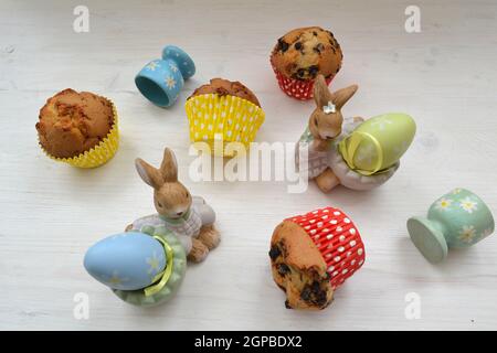 Easter decoration with muffins, eggs and rabbits. Easter bunnies. Vintage style Stock Photo