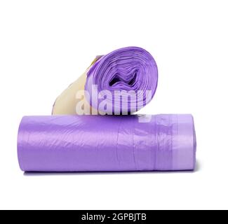 skein of purple plastic trash bags with strings isolated on white background, close up Stock Photo