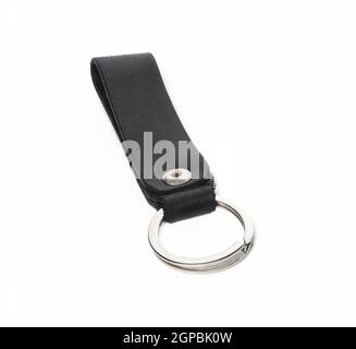 metal ring with leather key holder on white background, keychain Stock Photo