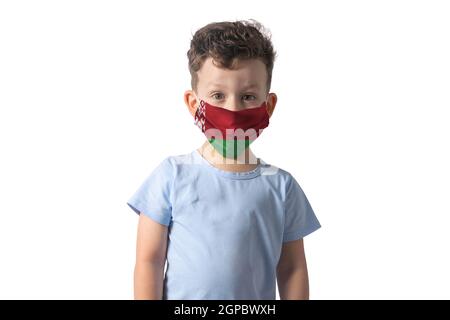 Respirator with flag of Belarus. White boy puts on medical face mask isolated on white background. Stock Photo