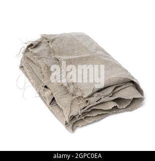 folded kitchen gray linen tea towel isolated on white background, close up Stock Photo