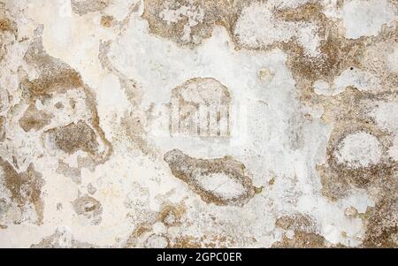 Closeup of dilapidated and weathered white wall texture, grungy background Stock Photo