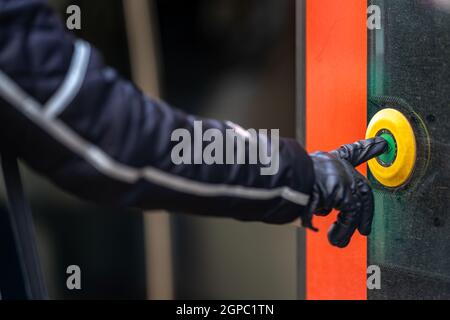 door open button in public transport Stock Photo