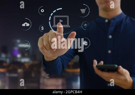 Hand touching digital virtual screen marketing concept icon business. Stock Photo