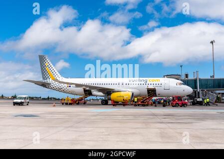 San Cristobal de La Laguna, Spain - August 12, 2021: Airplane on the runway of Los Rodeos airport. Vueling Airline Stock Photo