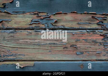 Closeup of damaged paint on a wooden railroad car. Open air limestone mining museum "Barbora", Czech Karst. Stock Photo