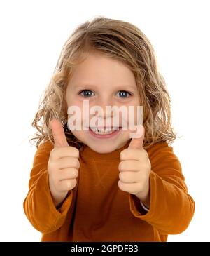 Adorable small blond child saying Ok isolated on white background Stock Photo