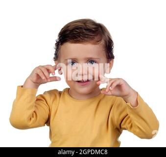 Shy small child two years old isolated on a white background Stock Photo