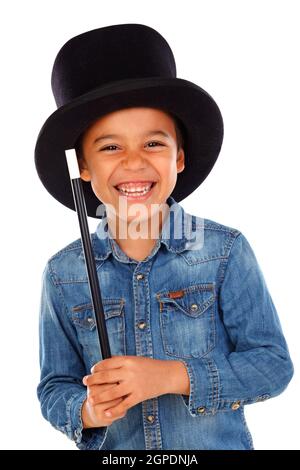 Funny small magician  with a top hat and a magic wand isolated on a white background Stock Photo