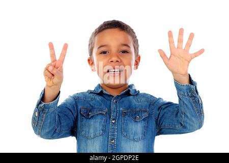 Adorable child counting with his fingers isolated on a white background Stock Photo