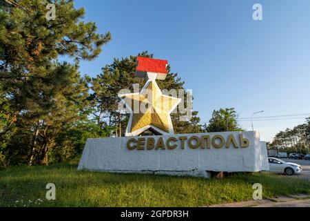 Sevastopol, Russia-June 21, 2021: Monument with the inscription Sevastopol by the road. Stock Photo