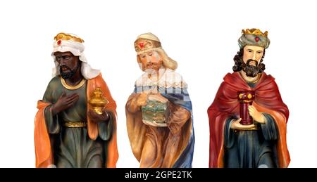 The three wise men. Ceramic figures isolated on white background Stock Photo