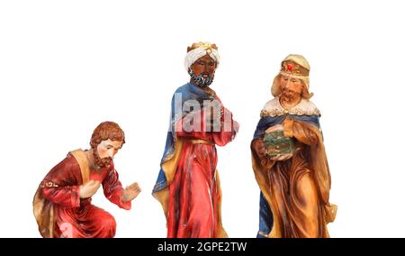 The three wise men. Ceramic figures isolated on white background Stock Photo