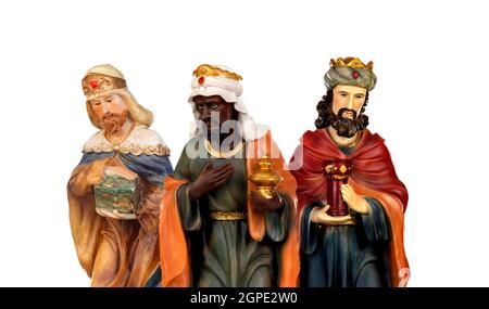 The three wise men. Ceramic figures isolated on white background Stock Photo