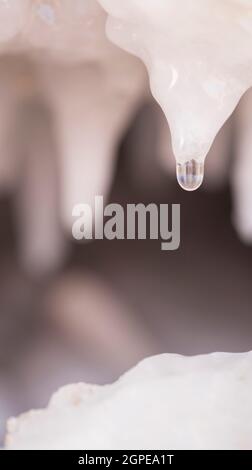 Water drips from a salt formation forming, due to water evaporation, in the Dead Sea, Israel Stock Photo