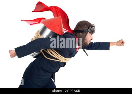 Businessman with homemade rocket and googles ready to take off! Stock Photo