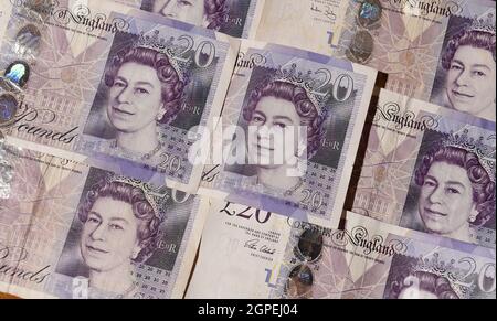 File photo dated 15/10/2016 of £20 notes. People are being encouraged to spend or bank their paper £20 and £50 banknotes before their legal tender status is withdrawn in a year's time. There are approximately £9 billion worth of paper £20 and £15 billion worth of paper £50 notes still in circulation. Issue date: Wednesday September 29, 2021. Stock Photo