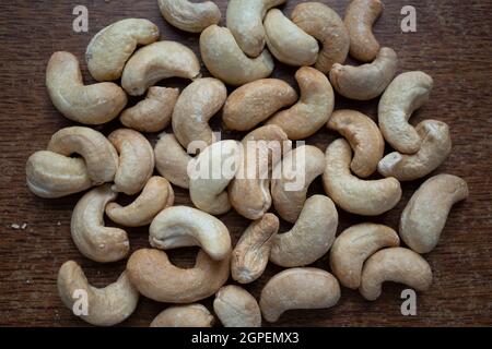 Tasty cashew nuts as background, top view Stock Photo