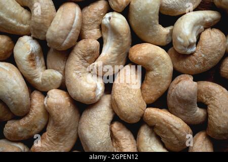 Tasty cashew nuts as background, top view Stock Photo